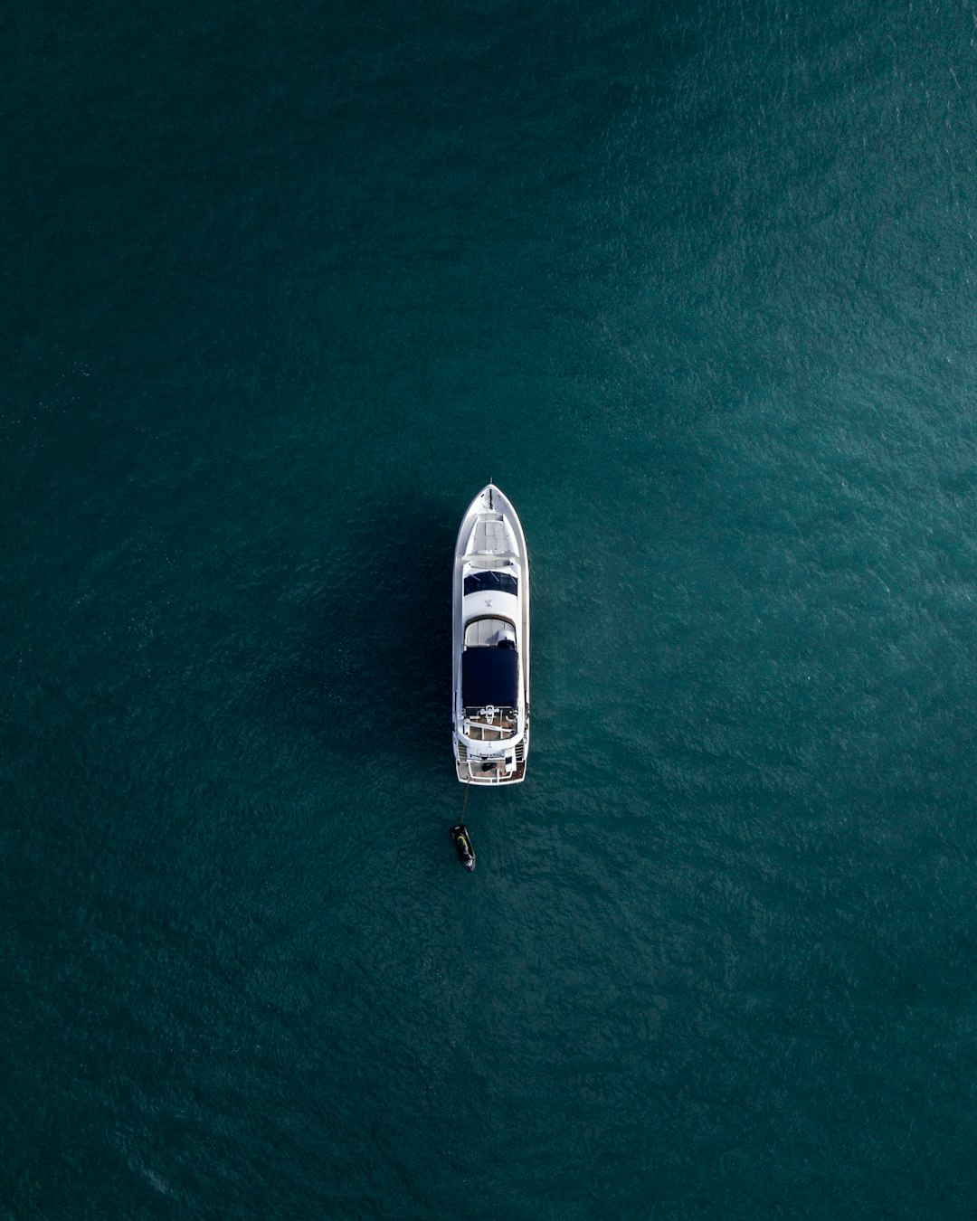 What are the top 5 selling perfumes for men? by Perfume Brands aerial photography of white yacht on calm waters