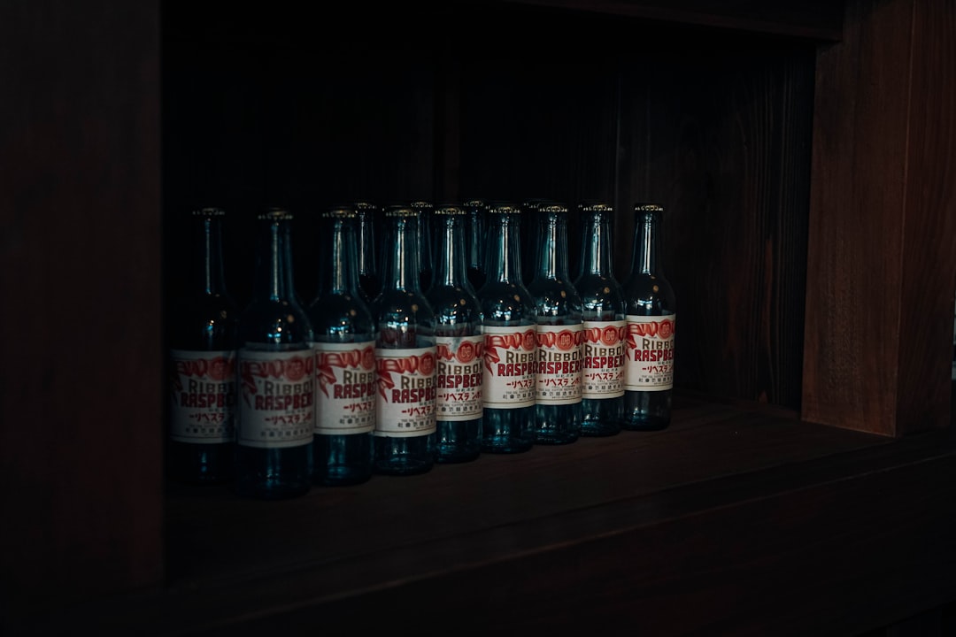 a row of bottles on a shelf